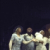 Actress Wilma Shakesnider (C, standing) w. cast members in a scene fr. the Houston Grand Opera production on Broadway of the opera "Porgy And Bess." (New York)