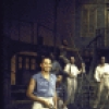 Actor Curtis Dickson (C) w. cast members in a scene fr. the Houston Grand Opera production on Broadway of the opera "Porgy And Bess." (New York)