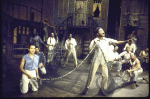 Actor Curtis Dickson (C) w. cast members in a scene fr. the Houston Grand Opera production on Broadway of the opera "Porgy And Bess." (New York)