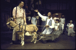 Actor Robert Mosley (C) w. cast members in a scene fr. the Houston Grand Opera production on Broadway of the opera "Porgy And Bess." (New York)