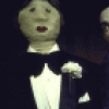 Actor Jonathan Pryce (with dummies) in a scene from the Broadway production of the play "Comedians" (New York)