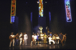 Actor Philip Casnoff (seated C) w. cast in a scene fr. the Broadway musical "Chess." (New York)