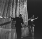 New York City Ballet production of "Native Dancers" with George Balanchine and Patricia Wilde taking a bow in front of curtain, choreography by George Balanchine (New York)