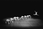 New York City Ballet production of "Concerto Barocco" Suzanne Farrell leaps in front of line of girls, choreography by George Balanchine (New York)