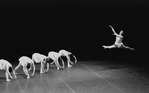 New York City Ballet production of "Concerto Barocco" Suzanne Farrell leaps in front of line of girls, choreography by George Balanchine (New York)