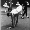 New York City Ballet production of "Symphony in C"; Patricia Neary tying toe shoes before performance, choreography by George Balanchine (New York)