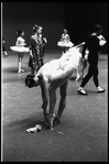New York City Ballet production of "Symphony in C"; Patricia Neary tying toe shoes before performance, choreography by George Balanchine (New York)