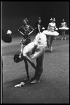New York City Ballet production of "Symphony in C"; Patricia Neary tying toe shoes before performance, choreography by George Balanchine (New York)