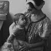 New York City Ballet dancer Jillana with her son in the dressing room (New York)