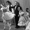 New York City Ballet production of "Bournonville Divertissements" with Stanley Williams bowing with dancers in front of curtain, choreography by August Bournonville, staged by Stanley Williams