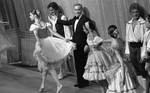 New York City Ballet production of "Bournonville Divertissements" with Stanley Williams bowing with dancers in front of curtain, choreography by August Bournonville, staged by Stanley Williams