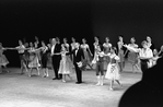 New York City Ballet production of "Bournonville Divertissements" with Stanley Williams and conductor Robert Irving bowing with dancers, choreography by August Bournonville, staged by Stanley Williams (New York)