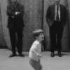 The Kennedy children visit backstage after a New York City Ballet performance of "Nutcracker", young John Kennedy examines fake nose of Shaun O'Brien, who played Herr Drosselmeyer.