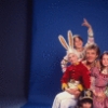 Studio photo of Peter Martins and students from the School of American Ballet in costume for a New York City Ballet production of "The Nutcracker" (New York)