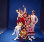 Studio photo of Peter Martins and students from the School of American Ballet in costume for a New York City Ballet production of "The Nutcracker" (New York)