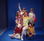 Studio photo of Peter Martins and students from the School of American Ballet in costume for a New York City Ballet production of "The Nutcracker" (New York)