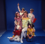 Studio photo of Peter Martins and students from the School of American Ballet in costume for a New York City Ballet production of "The Nutcracker" (New York)