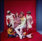 Studio photo of Peter Martins and students from the School of American Ballet in costume for a New York City Ballet production of "The Nutcracker" (New York)