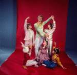 Studio photo of Peter Martins and students from the School of American Ballet in costume for a New York City Ballet production of "The Nutcracker" (New York)