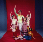 Studio photo of Peter Martins and students from the School of American Ballet in costume for a New York City Ballet production of "The Nutcracker" (New York)