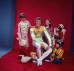 Studio photo of Peter Martins and students from the School of American Ballet in costume for a New York City Ballet production of "The Nutcracker" (New York)