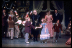 Shaun O'Brien as Drosselmeyer and his nephew being greeted by Mary, in a New York City Ballet production of "The Nutcracker" (New York)