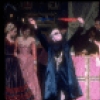Shaun O'Brien as Drosselmeyer entertaining children with magic tricks, in a New York City Ballet production of "The Nutcracker" (New York)