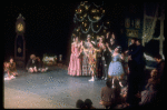 Shaun O'Brien as Drosselmeyer entertaining children with dancing dolls (incl. Nichol Hlinka as Columbine), in a New York City Ballet production of "The Nutcracker" (New York)