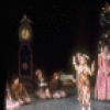 Shaun O'Brien as Drosselmeyer entertaining children with dancing dolls (incl. Nichol Hlinka as Columbine), in a New York City Ballet production of "The Nutcracker" (New York)