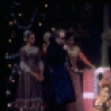 Shaun O'Brien as Drosselmeyer entertaining children with dancing dolls (incl. Nichol Hlinka as Columbine), in a New York City Ballet production of "The Nutcracker" (New York)