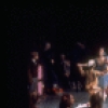 Shaun O'Brien as Drosselmeyer entertaining children with dancing dolls (incl. Nichol Hlinka as Columbine), in a New York City Ballet production of "The Nutcracker" (New York)