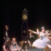 Shaun O'Brien as Drosselmeyer entertaining children with dancing dolls (incl. Nichol Hlinka as Columbine), in a New York City Ballet production of "The Nutcracker" (New York)