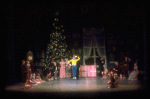Shaun O'Brien as Drosselmeyer entertaining children with toy soldier, in a New York City Ballet production of "The Nutcracker" (New York)