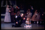 Shaun O'Brien as Drosselmeyer comforting Mary with her broken Nutcracker, in a New York City Ballet production of "The Nutcracker" (New York)