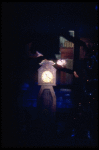 Shaun O'Brien as Drosselmeyer atop the grandfather clock, in a New York City Ballet production of "The Nutcracker" (New York)