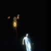 Shaun O'Brien as Drosselmeyer atop the grandfather clock directing the mice while Mary flees in fear, in a New York City Ballet production of "The Nutcracker" (New York)