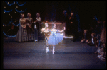 Party scene with dancing dolls Pierrot and Columbine, in a New York City Ballet production of "The Nutcracker" (New York)