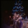 Party scene with boys presenting bouquets to girls, in a New York City Ballet production of "The Nutcracker" (New York)