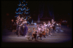 Party scene with boys presenting bouquets to girls, in a New York City Ballet production of "The Nutcracker" (New York)