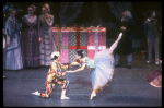 Party scene with dancing dolls Pierrot and Columbine, in a New York City Ballet production of "The Nutcracker" (New York)