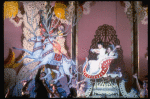 Mary and the Prince riding off in a reindeer drawn sleigh, in a New York City Ballet production of "The Nutcracker" (New York)