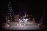 Act I party scene with dancing dolls, Kathleen Tracey as Harlequin and Margaret Tracey as Columbine, in a New York City Ballet production of "The Nutcracker" (New York)