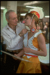 New York City Ballet production of "Tricolore" with designer Rouben Ter-Arutunian checking Karin von Aroldingen's costume at Karinska's shop (New York)