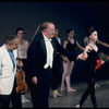 New York City Ballet conductor Robert Irving takes a bow with violinist Joseph Silverstein and Kay Mazzo after "Violin Concerto", choreography by George Balanchine (New York)