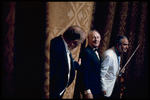 New York City Ballet conductor Robert Irving takes a bow with George Balanchine and violinist Joseph Silverstein after "Violin Concerto", choreography by George Balanchine (New York)