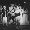 Producer Joseph Papp (2R, holding cake) with castmembers (L-R) Mary Elizabeth Mastrantonio, Jeff Goldblum and Michelle Pfeiffer onstage to celebrate Papp's 68th birthday after a Central park performance of "Twelfth Night"