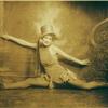 Dancer in split, wearing top hat
