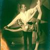 Female dancer being partnered in high extension