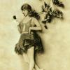 Dancer contemplating a dog hand puppet