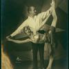 Female dancer being partnered in high extension